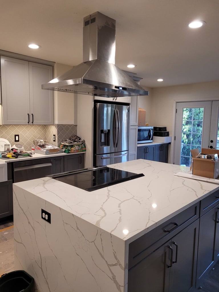 island with a waterfall edge countertop
