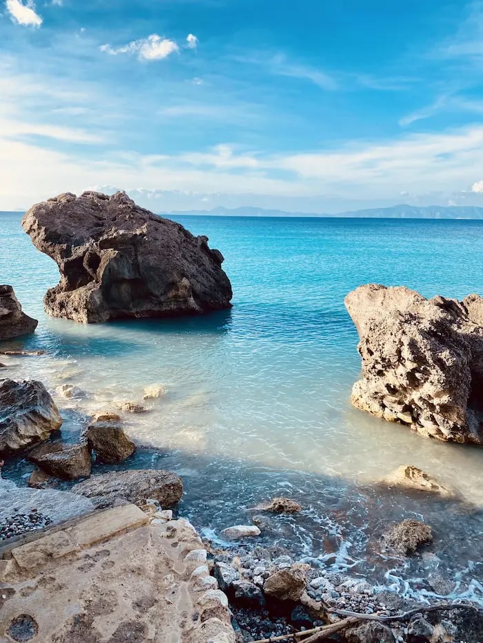  a rocky beach near a body of water