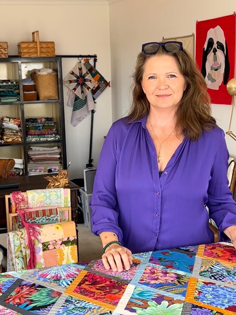 Sonja, founder of SoGrizz Quilting