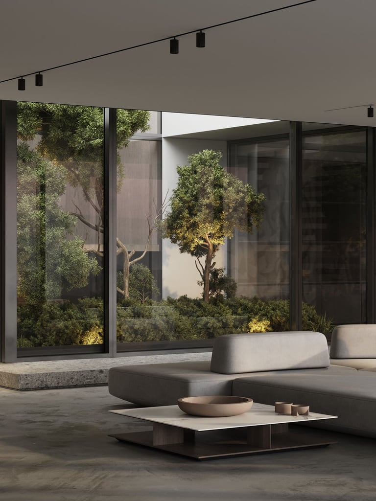 3D rendering of a modern indoor space with grey sectional sofa, low coffee table, glass panels, greenery, and natural light