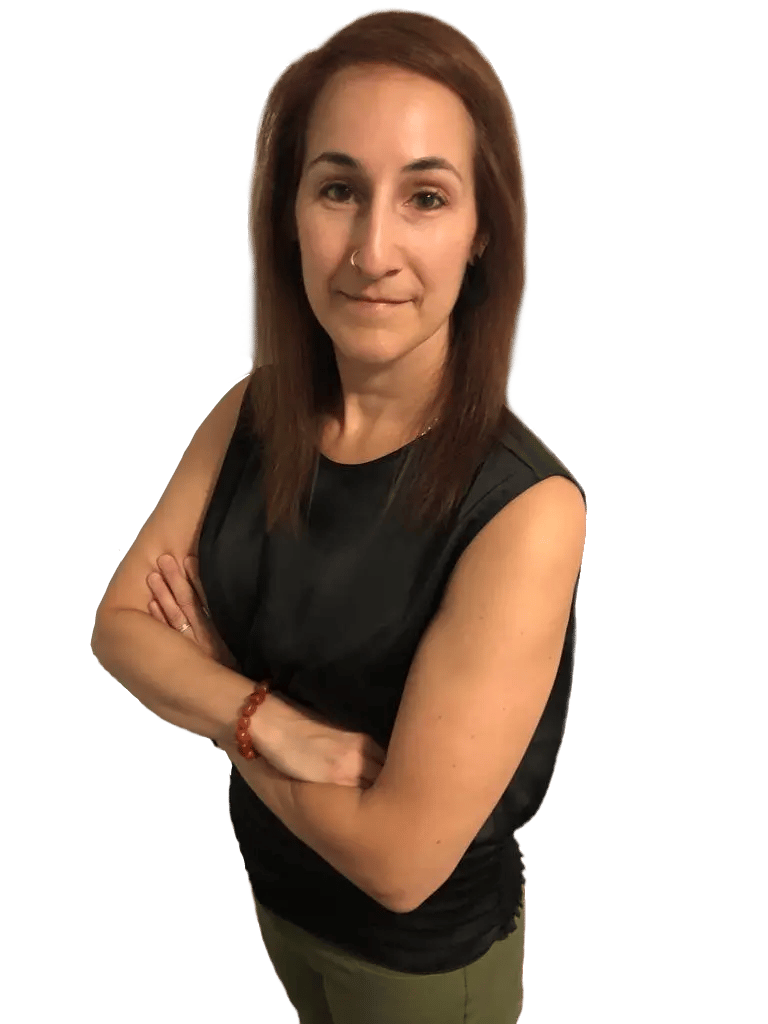 Michelle Mulligan, Mortgage Agent Level 2 at MortgageWell, leaning forward with arms crossed