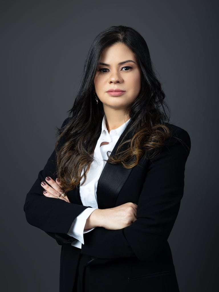 a woman in a suit and tie is posing for a portrait elane marques