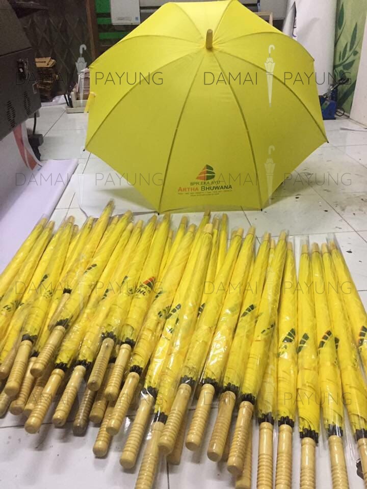 Payung promosi polos standard kuning artha bhuwana