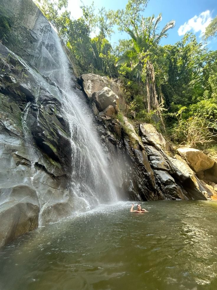 a person swimming in a body of water