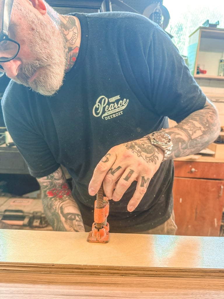 Master woodworker creating custom project in a woodshop