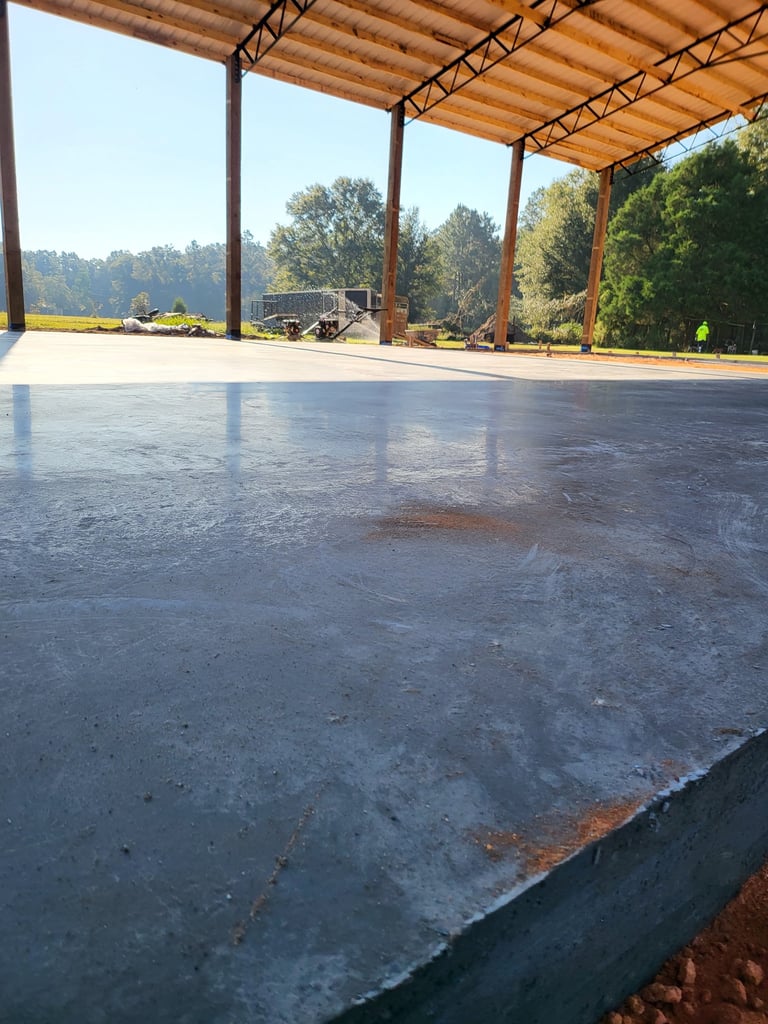 Newly poured concrete parking lot in Pensacola FL with clean, level surface