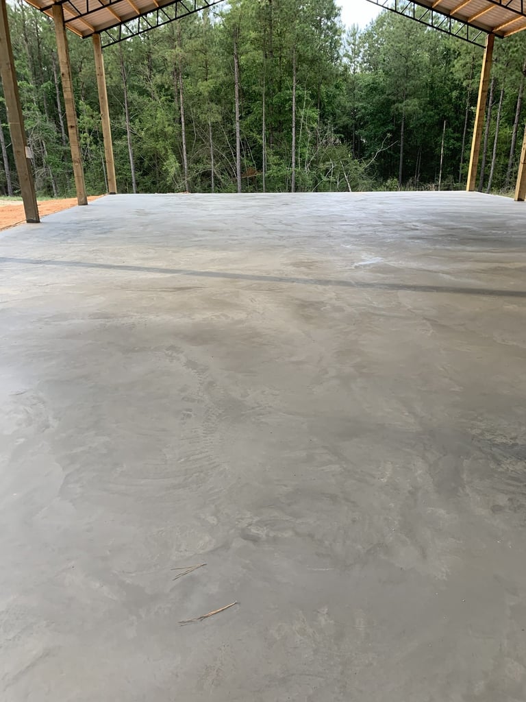 Concrete slab foundation installation for residential structure with reinforced concrete surface
