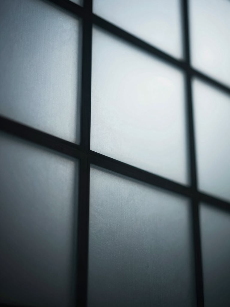 macro shot of abstract data visualizations on a glass screen, high-contrast natural light, deep shadows, crisp, cool tones