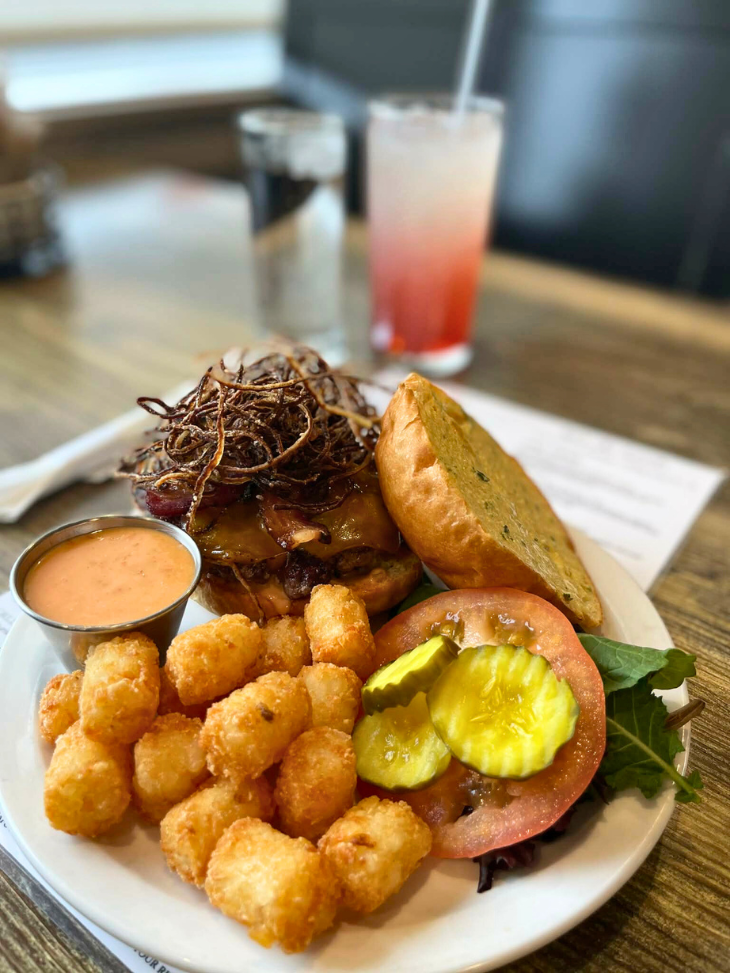 burger bacon fried onions cheddar pickles aioli philly bun