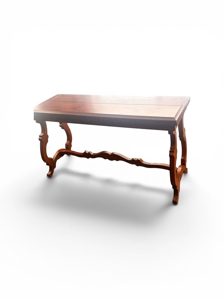 Elegant antique wooden console table with ornate carved legs and a polished dark wood finish on a white background.