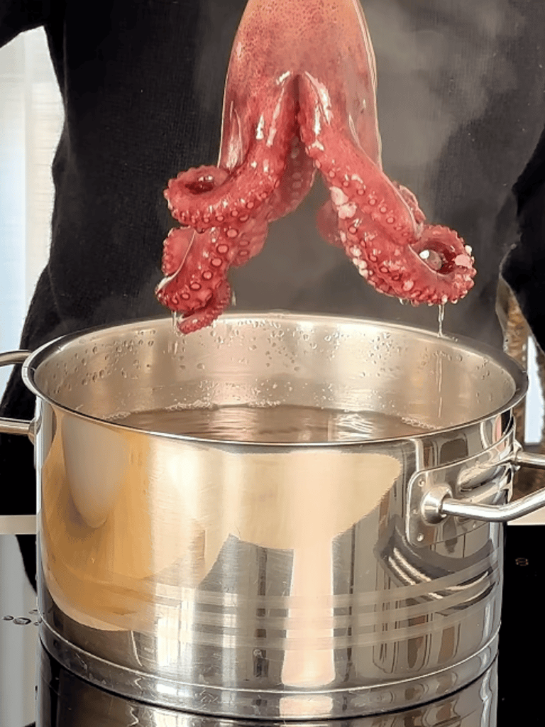 Dip the tentacles into the boiling water