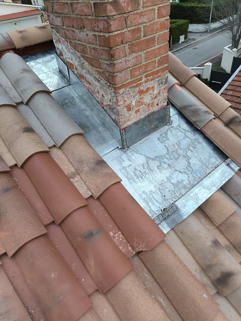 rénovation abergement cheminée sur une  toiture