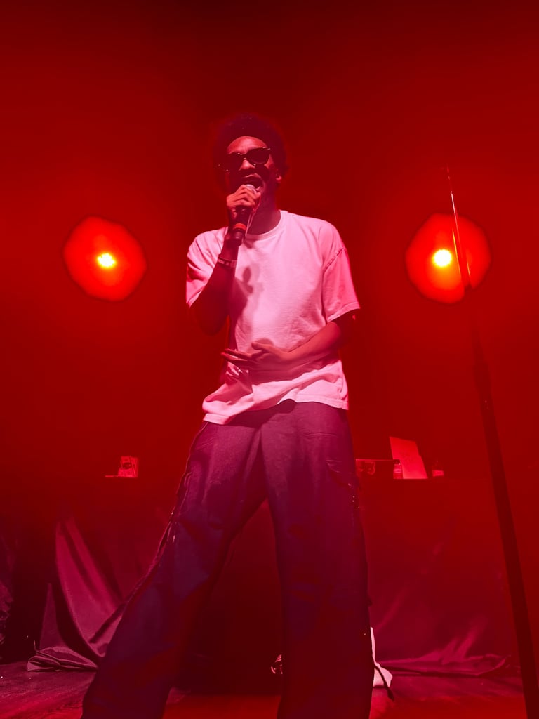 man rapping on stage 