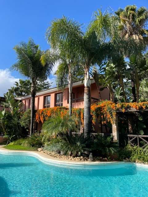8 bedroom villa with tropical gardens and saltwater pool on Marbella's Golden Mile
