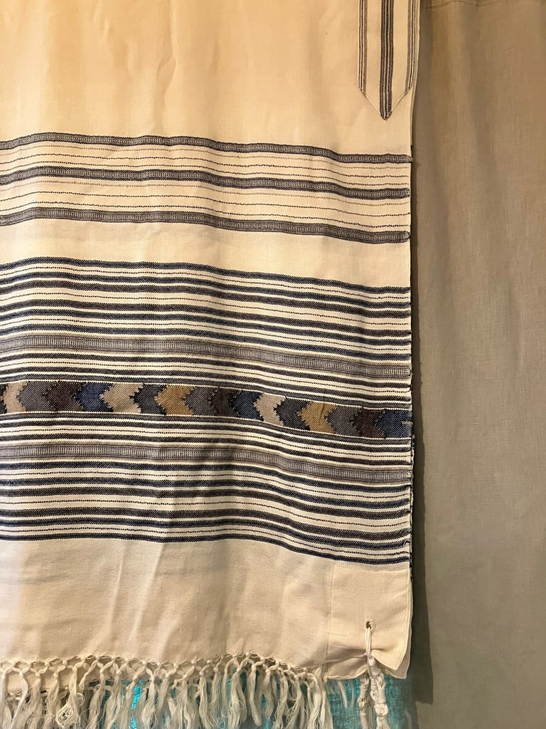 a tallit on a wall