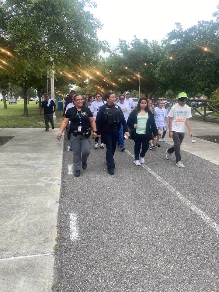 a group of people marching 