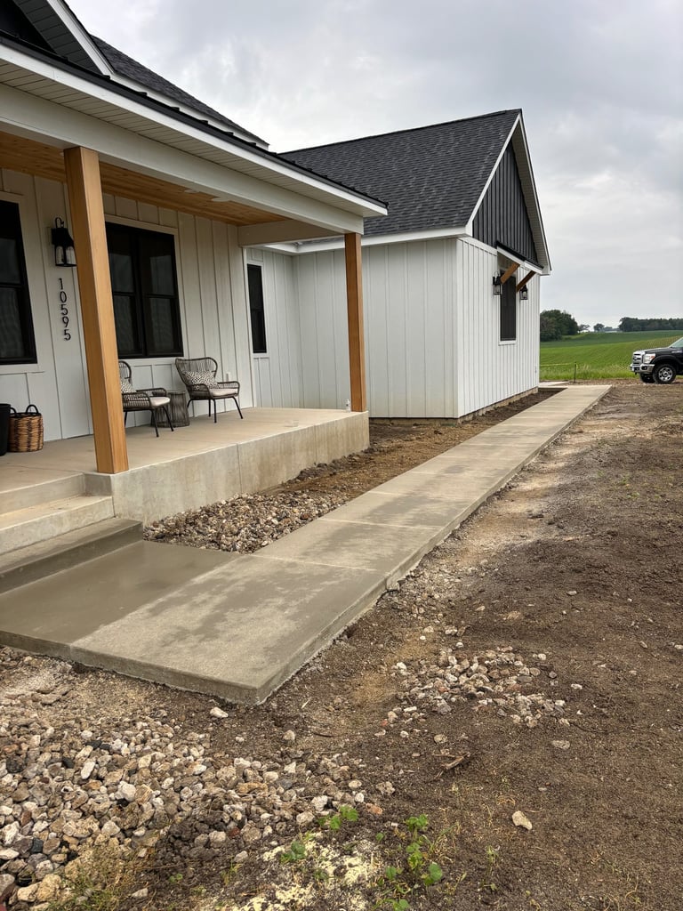 concrete walkway and porch at new MN residential build