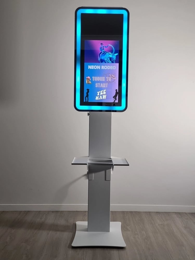 DSLR mirror photo booth with a 21.5 inch touch screen and LED lit mirror face used for events across the Redlands.