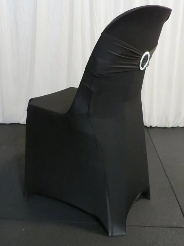 Plastic chair with black spandex cover with bling sash available for hire in Redlands.