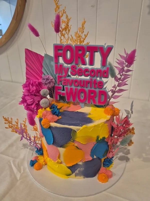 Sweetaz Crew admiring the personalised cake for a Birthday Party in Cleveland, Redlands - party hire by SweetAz Co.