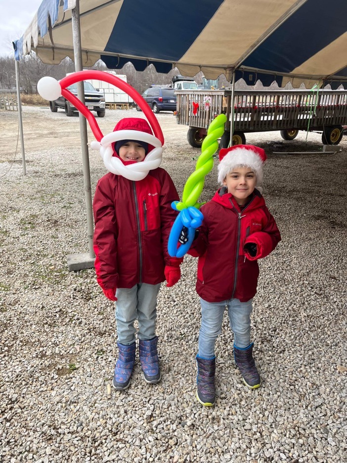 Kids posing with their balloons