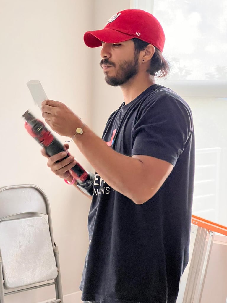 a man in a red hat and a red baseball cap