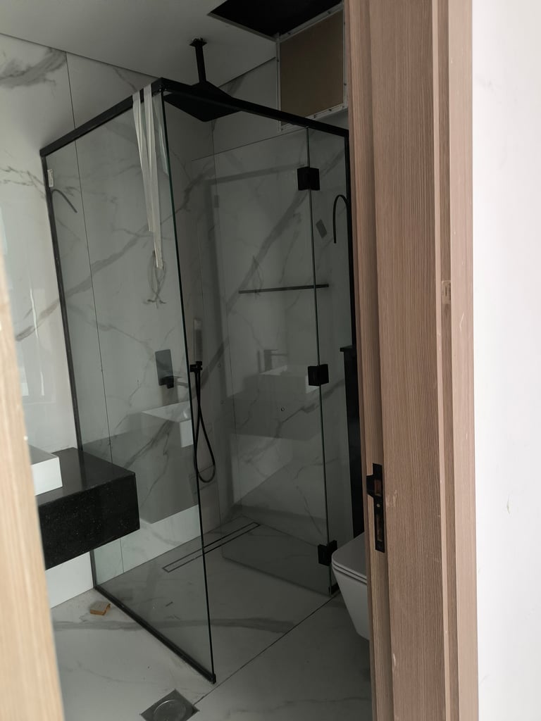 10mm tempered glass shower enclosure with waterproof seals and chrome hinges.