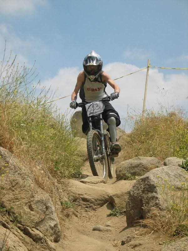 mountain biker down hill racer rider with flat pedals