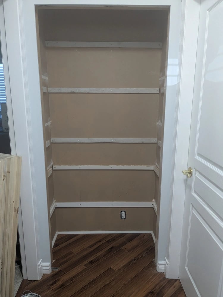 New shelf cleats in kitchenware closet