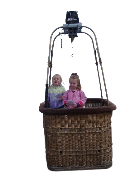 The twins in a hot air balloon gondola