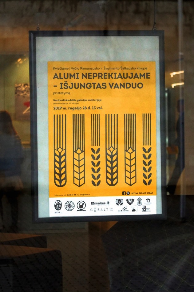 Poster in the gallery window. Yellow, rye illustrations.