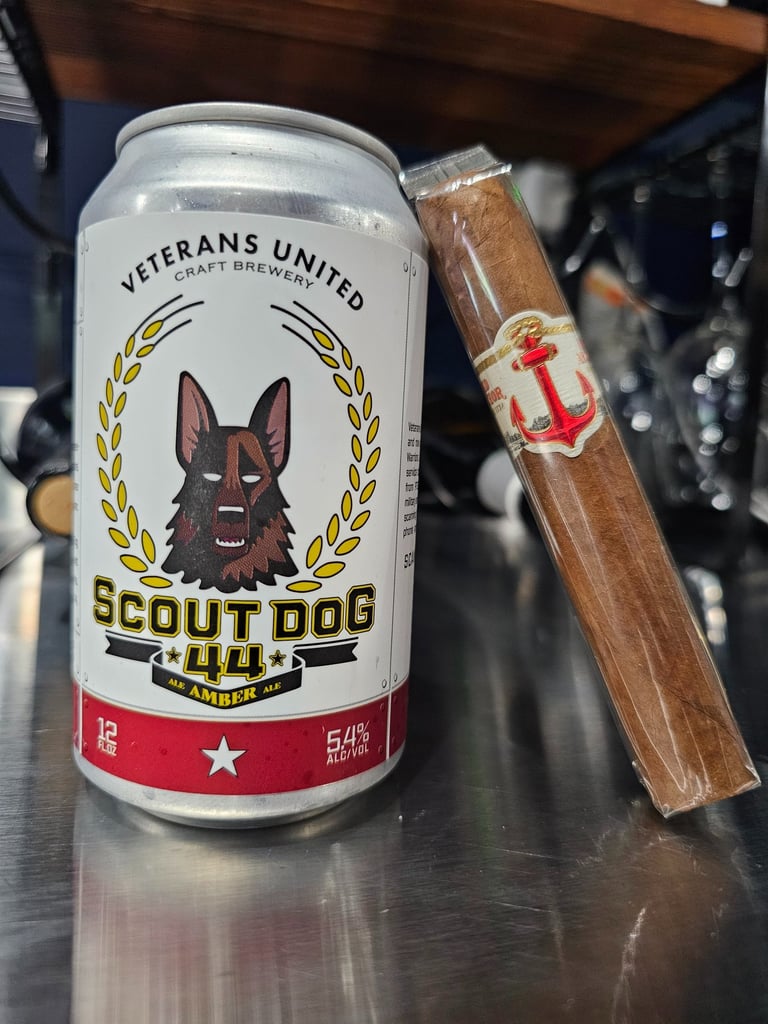 cigar resting against can of scout dog beer
