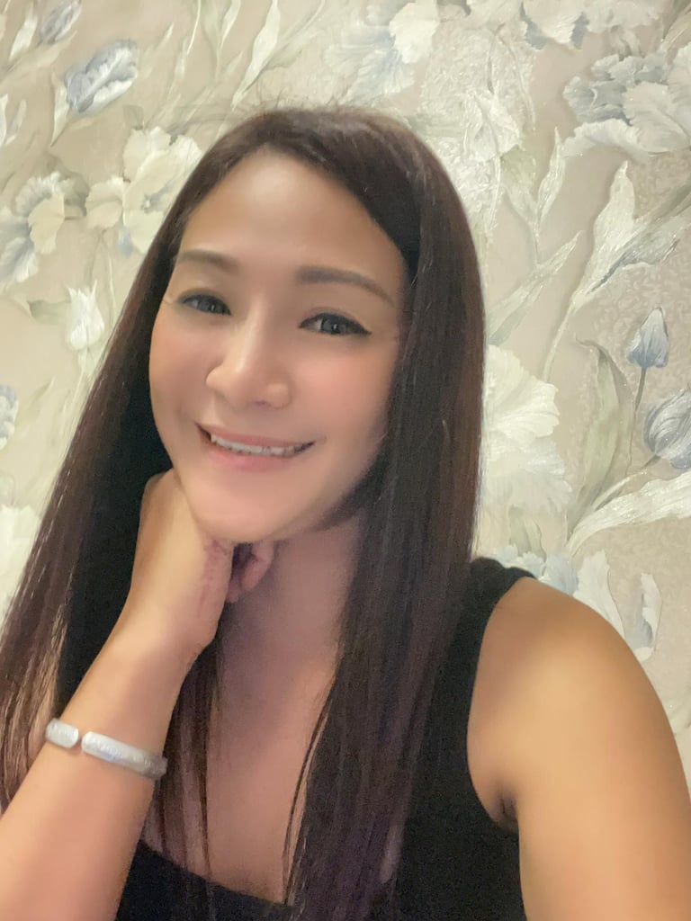 Lady therapist with hand on chin 