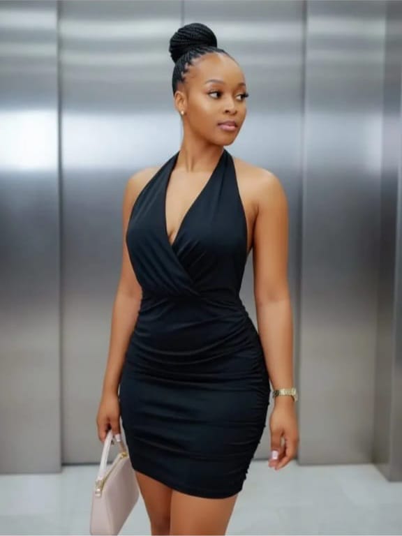 Elegantly dressed home massage therapist