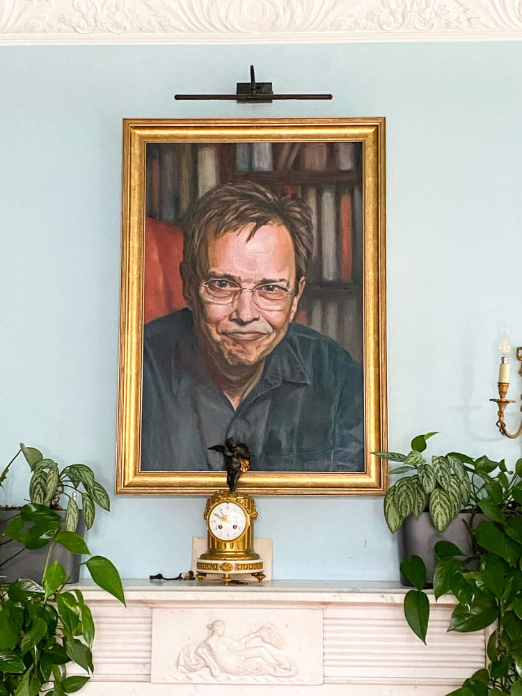 Completed hand-painted portrait of a father in a gold frame, honouring personality, memory and legac