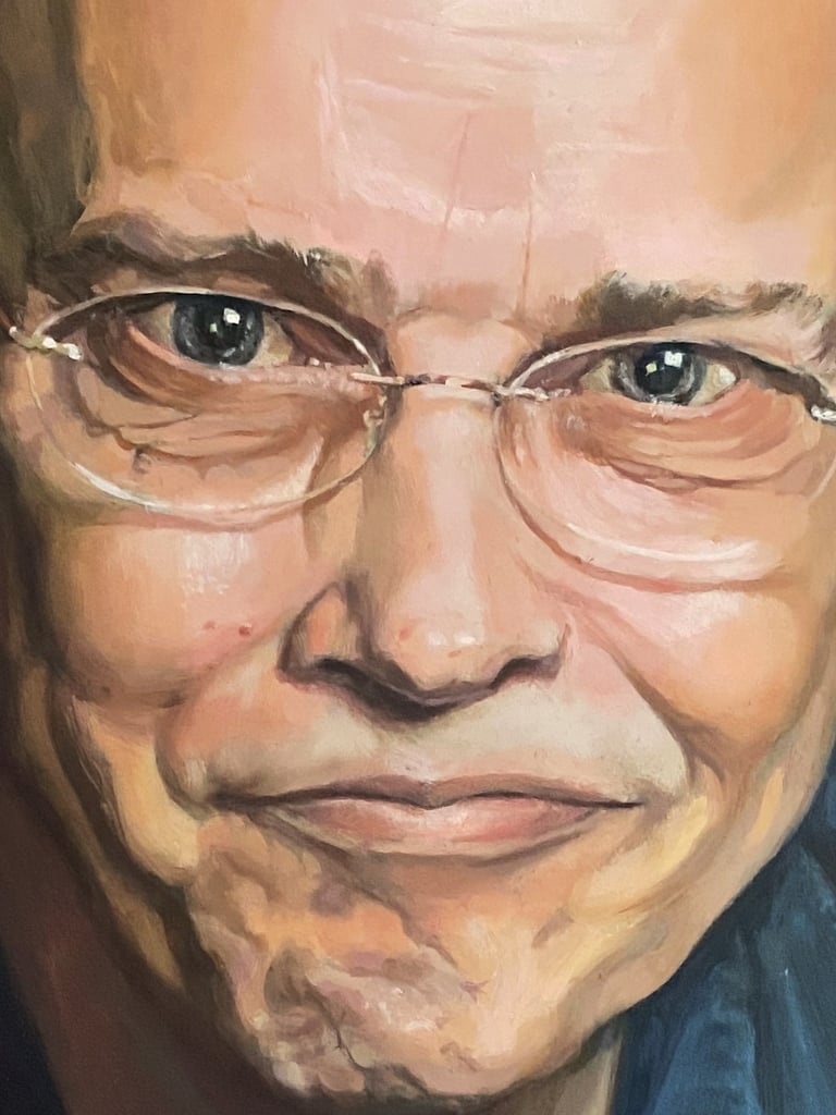 Detail of an oil-painted male portrait, focusing on expressive eyes and a smile—a study of warmth, intelligence and character