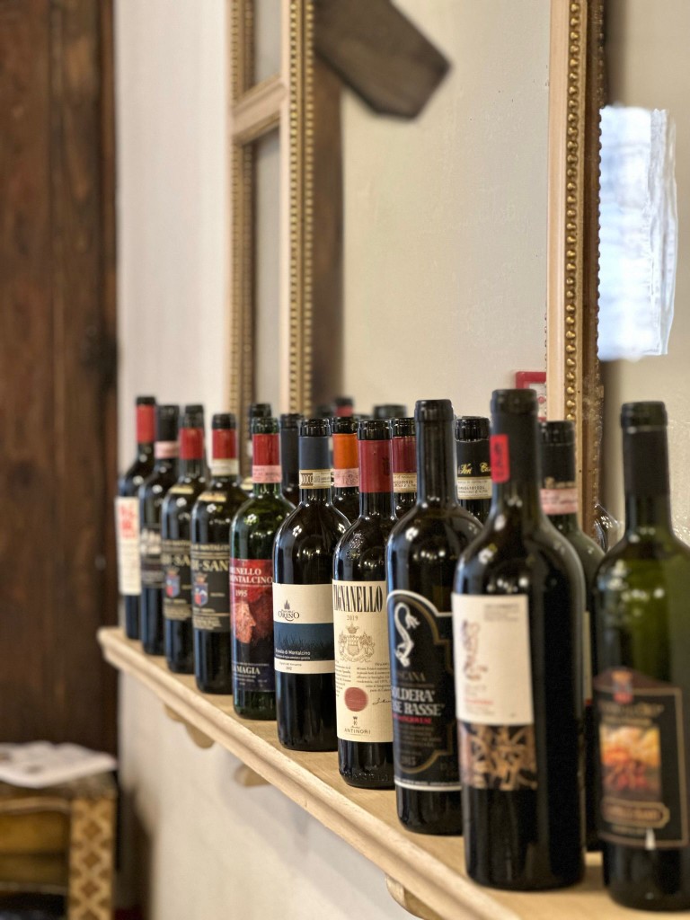 Premium wine selection featuring Soldera, Tignanello, and Biondi Santi at Il Grifo.