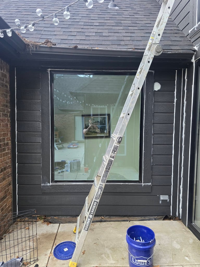 Framed window that is is being sealed from rain leaks