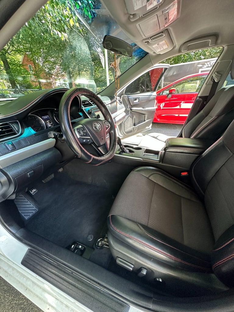 full interior detailing of white toyota