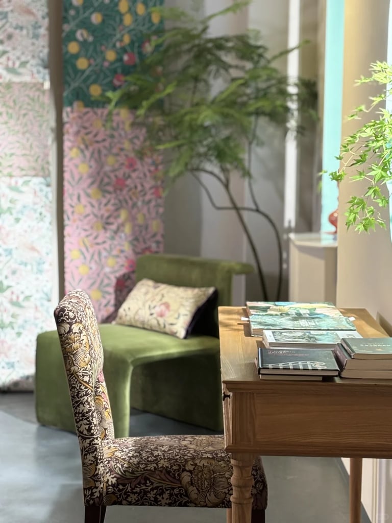 William Morris-inspired interior featuring botanical patterns, natural materials, and traditional Arts and Crafts design.