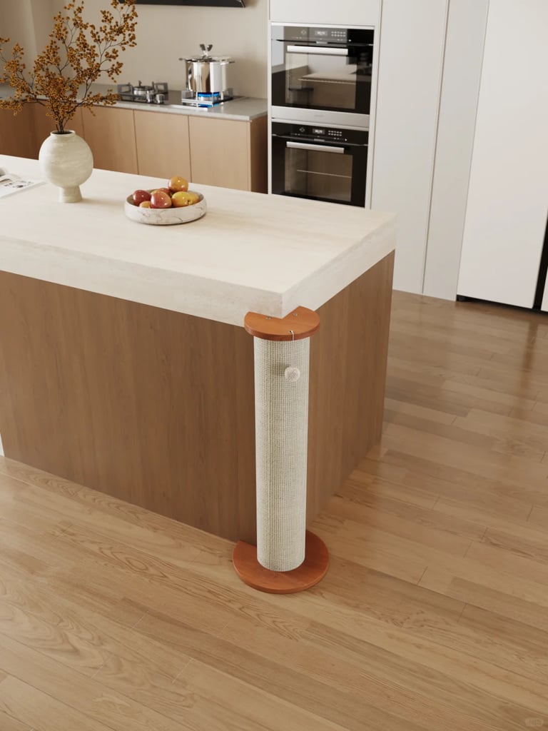 Slim sisal cat scratching post with wooden base placed beside a kitchen island in a warm modern home