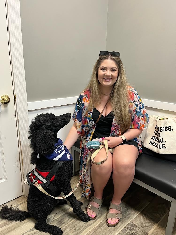 Therapy dog Raja and handler Holly.