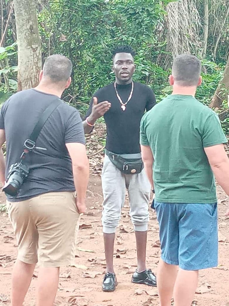 Dahomey African Tours Guide leading Tour in Kpasse's Sacred Forest of Ouidah in Benin