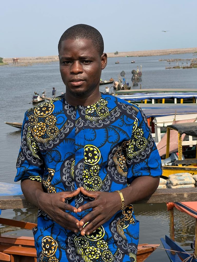 Dahomey African Tours Senior Guide and Tour Planner at Ganvie Stilt Village in Benin
