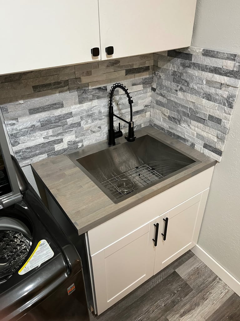 Laundry room sink, cabinet and backsplash replacement