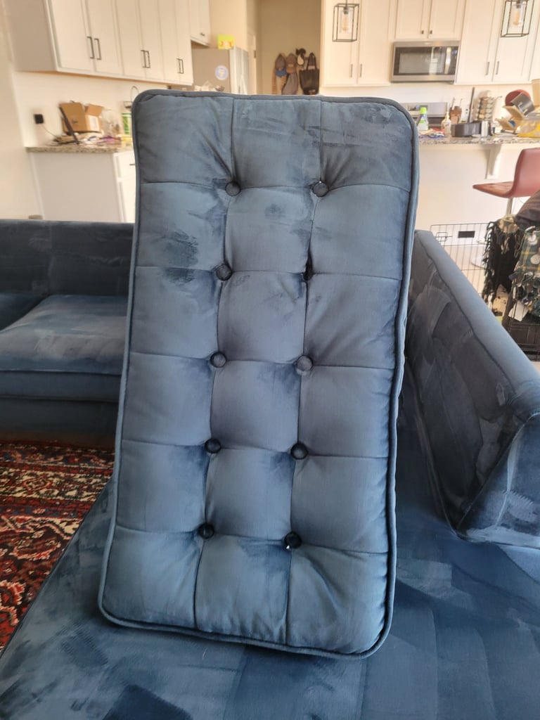Blue couch cushion just Cleaned by King Organic Clean