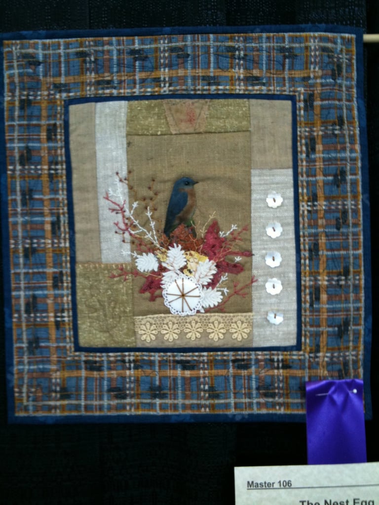 The Nest Egg by Lu Peters. Art quilt using image transfer of digital photo by Brett Peters.