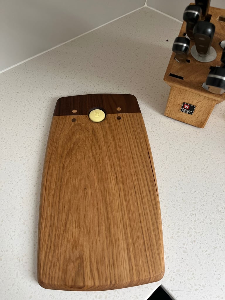 American Walnut and English Oak chopping board with space saving wall hanger