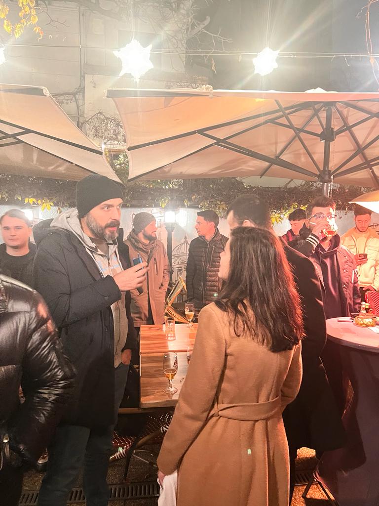 close-up with Daiana speaking to someone