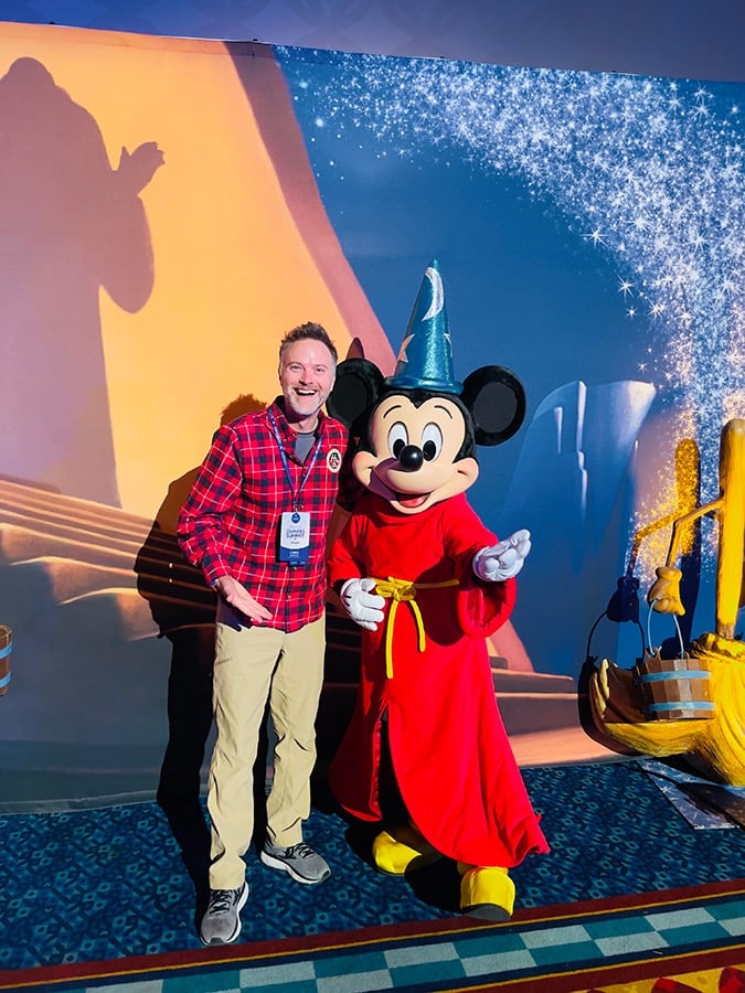Chris Breedlove pictured with Mickey Mouse at the Disneyland® Hotel.